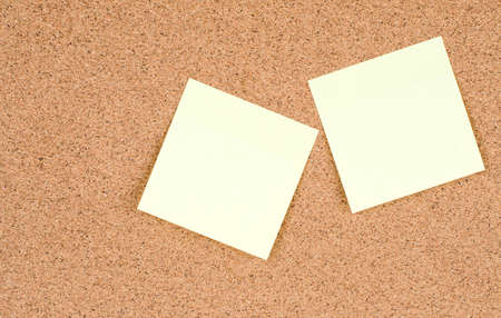 Blank stick notes on bulletin board texture or background, cork board, used for background.の写真素材