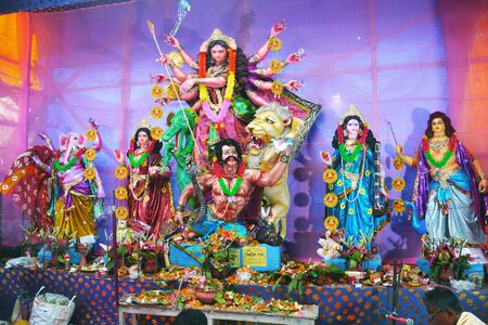 Goddess Durga Idol decorated at Durga Puja Pandal in village of rural West Bengal the biggest...