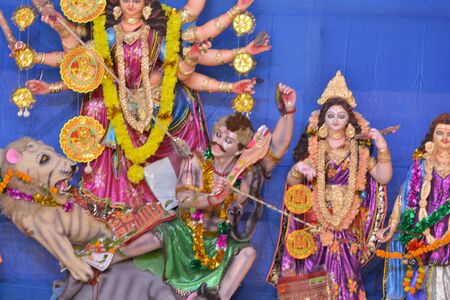 Goddess Durga Idol at decorated at Durga Puja Pandal in village of rural West Bengal the biggest religious festival of people of west Bengal or Bengalisの写真素材