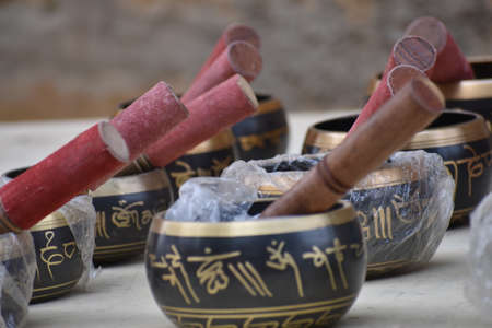 antique goods made of metal,stone and glass selling on roadside of jaisalmer