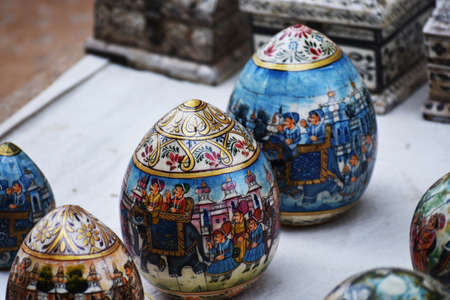 antique goods made of metal,stone and glass selling on roadside of jaisalmer