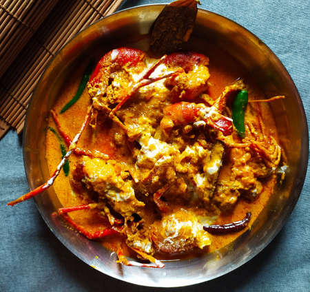 Chingri malai curry also known as prawn malai curry, is a Odisha curry made from Tiger and King prawns and coconut milk and flavoured with spicesの写真素材