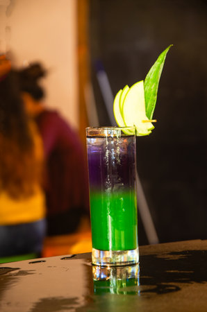 Alcoholic cocktail drink on the bar in a nightclub bar.の写真素材