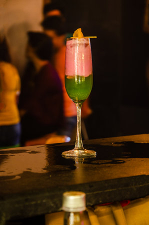 Alcoholic cocktail on the table in a pub, Thailand.の写真素材