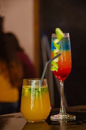 Colorful cocktails on a bar counter in a restaurant. Selective focus.の写真素材