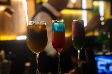 Colorful cocktails on the bar counter in a nightclub. Nightlifeの写真素材