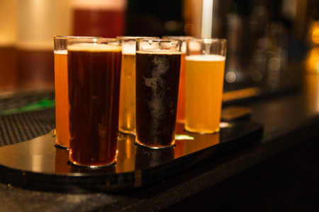 Fresh draught chilled beer refers to beer that is served directly from a keg or cask, maintaining its freshness and optimal temperature.の写真素材