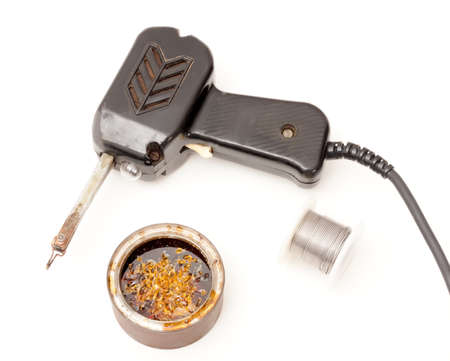 Soldering equipment containing a soldering gun, a box of rosin and tin wire  の写真素材