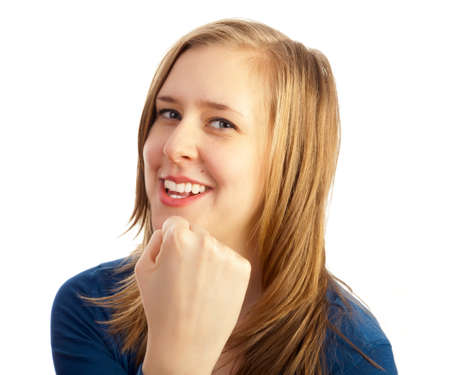Lovely beautiful girl threatening with her fist の写真素材