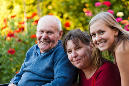 Daughter and granddaughter visiting their kind grandfather 