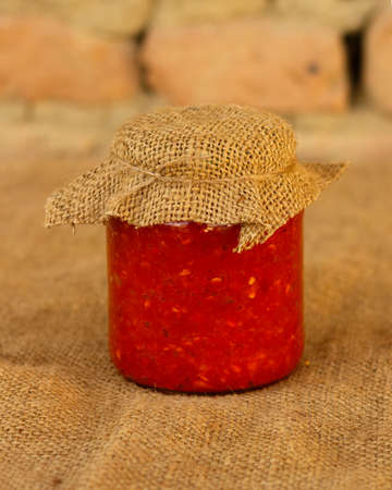 A traditional Romanian cooked preserve from varoius vegetables named zacusca 