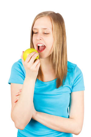 Gorgeous woman tasting her healthy apple の写真素材