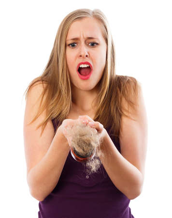 Huge hair loss, girl suffering from alopecia.の写真素材