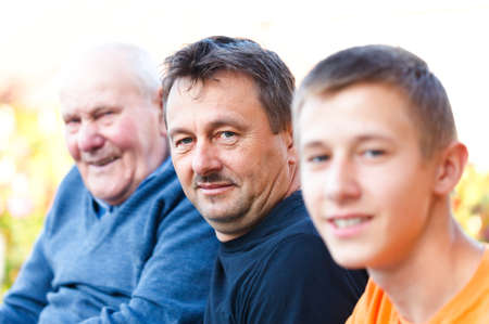 Portrait of male generations in the family.の写真素材
