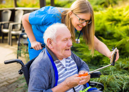 Close up of internet chatting at the nursing home because of isolation. の写真素材