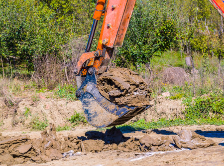 Architectural work with bulldozer for the base of the house.の写真素材