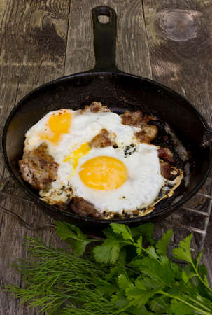 Grilled eggs on the panの写真素材