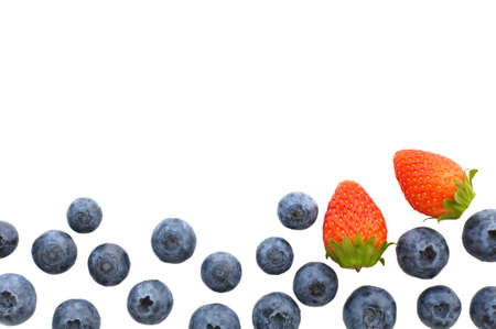 Strawberry and blueberry which are berries fruit isolated on white background and can use for...