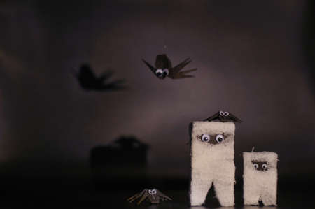 The Halloween mummy that made from  paper and bandage with the origami (or paper folding) bats...