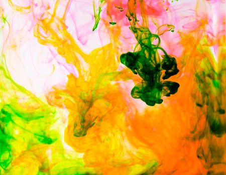 Food color drop and dissolve in water for abstract and background.