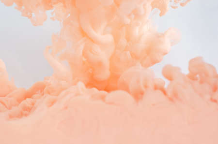 Blurred and focus pink poster color dissolving in water for abstract and backgorund concept.の写真素材