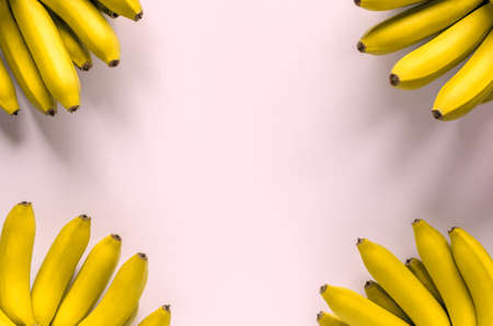 Banana fruit on pink background.