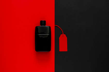 Red price tags with discount merchandise on red and black background. Black Friday concept.の写真素材