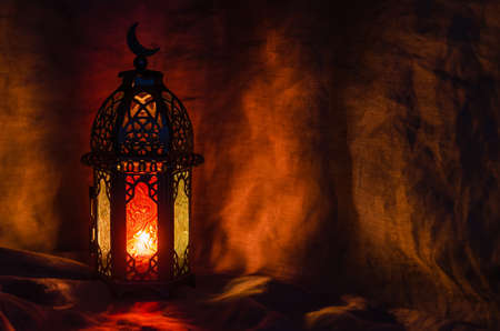 Black lantern on dark background for the Muslim feast of the holy month of Ramadan Kareem.の写真素材