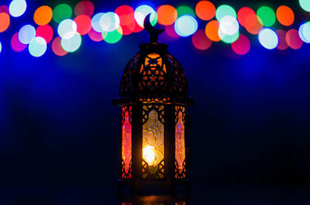 Lantern with colorful bokeh lights for Islamic new year and Ramadan Kareem concept.の写真素材