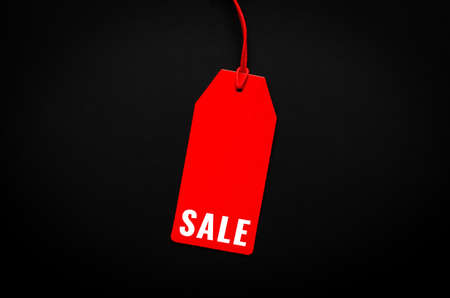 Red price tag with word for shopping and sale on Black Friday concept.の写真素材