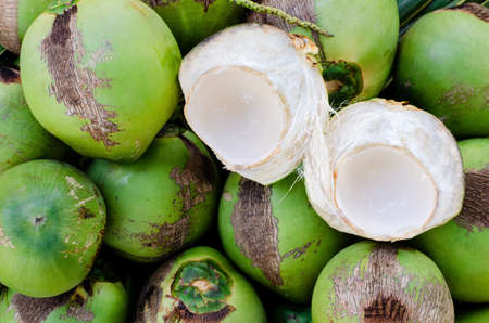 Young fresh sweet Thai coconut fruits for summer fruit concept.