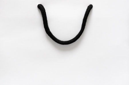 White shopping paper bag for Black Friday shopping sale concept.の写真素材