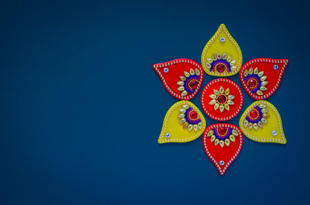 Diwali festival decorative object that can put with diwa lamp for decoration on blue background.の写真素材