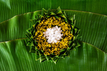 Top view of  Krathong decorates with colorful flowers for Thailand full moon or Loy Krathong...