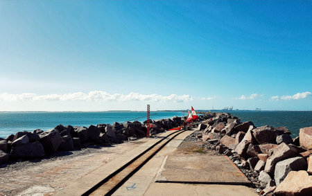 trolley ride on moles da barra, between rocks and rails the sea shows its beauty