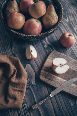 still life apples in a wicker basketの写真素材