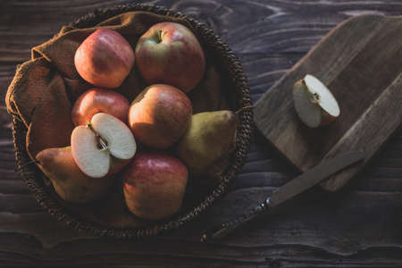 still life apples in a wicker basketの写真素材