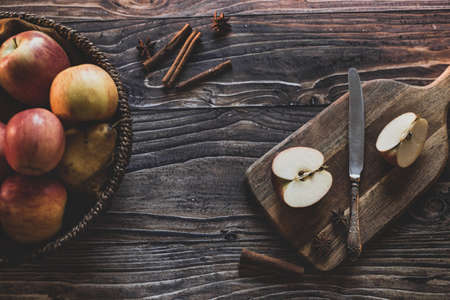 still life apples in a wicker basketの写真素材