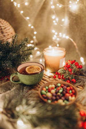 evening tea party with Christmas lightsの写真素材