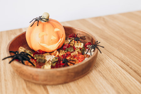Autumn Still Life Halloween Pumpkin, Sweets and Spidersの写真素材