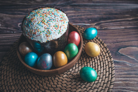 Still life Easter eggs and Easter cake on the table. The concept of home comfort in the bright holiday of Easter.の写真素材