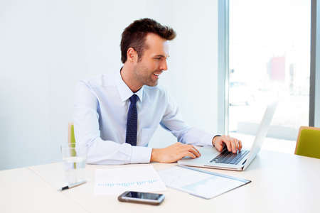Man working on laptop in the office
