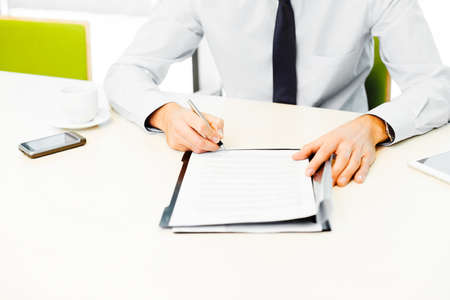 Signing contract. Business concept. Closeup of businessman working in the office.