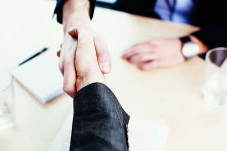 Close-up of a business handshakeの写真素材