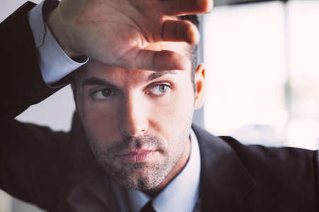 Depressed young professional looking awayの写真素材