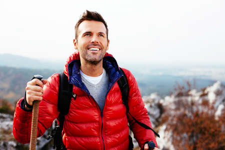 Happy hiker looking into the distanceの写真素材