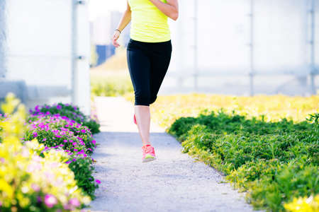 Closeup of woman running fastの写真素材