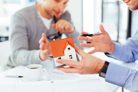 Two architects discussing an architectural problemの写真素材