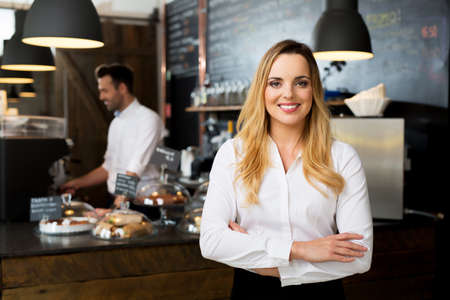 Successful restaurant manager, small business owner at workの写真素材