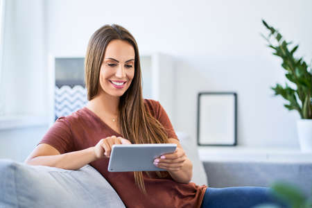 Woman looking at phoneの写真素材